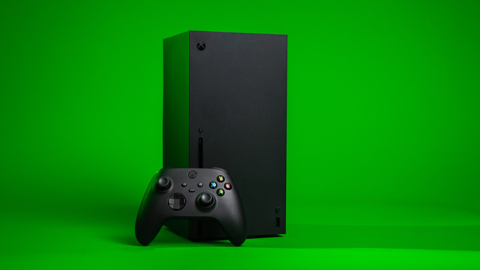 Black Xbox One console with controller.